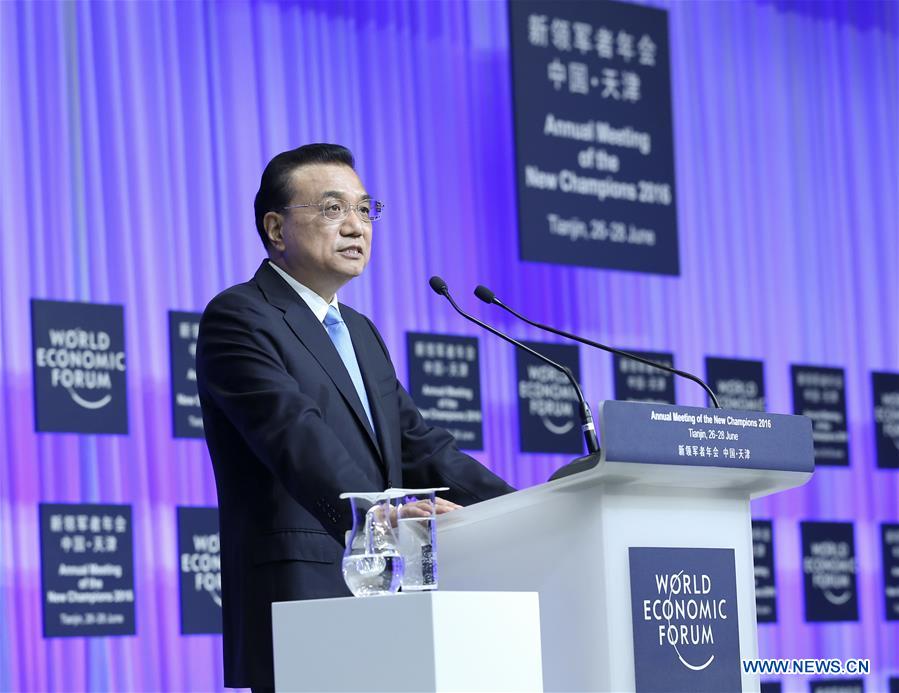 Chinese Premier Li Keqiang addresses the opening ceremony of the Annual Meeting of the New Champions 2016, or Summer Davos Forum, in Tianjin, north China, June 27, 2016. Chinese Premier Li Keqiang addresses the opening ceremony of the Annual Meeting of the New Champions 2016, or Summer Davos Forum, in Tianjin, north China, June 27, 2016.