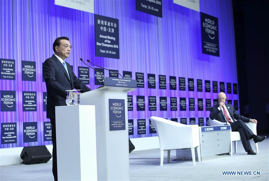 Chinese Premier Li Keqiang addresses the opening ceremony of the Annual Meeting of the New Champions 2016, or Summer Davos Forum, in Tianjin, north China, June 27, 2016. Chinese Premier Li Keqiang addresses the opening ceremony of the Annual Meeting of the New Champions 2016, or Summer Davos Forum, in Tianjin, north China, June 27, 2016.