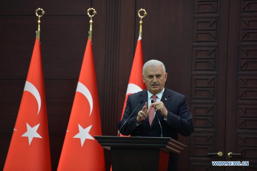 Turkish Prime Minister Binali Yildirim delivers a speech during a press conference after a Turkish-Israeli meeting, in Ankara, Turkey, on June 27, 2016.