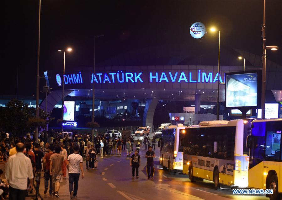 Policemen check staff licenses at the entrance to Ataturk International Airport in Istanbul, Turkey, June 29, 2016.
