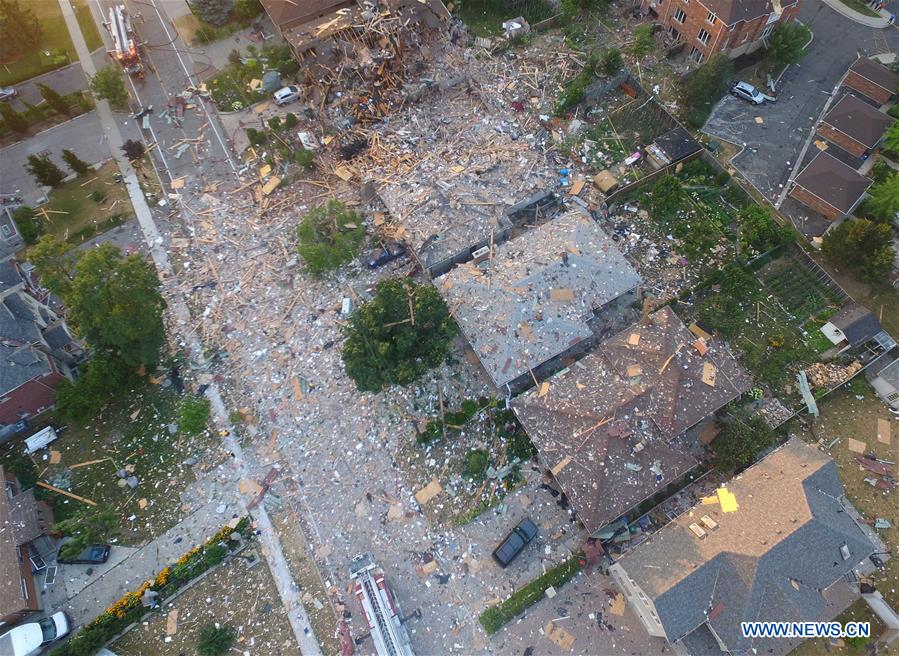 Policemen block the road to the explosion site in Mississauga, Ontario, Canada, on June 28, 2016. Policemen block the road to the explosion site in Mississauga, Ontario, Canada, on June 28, 2016.