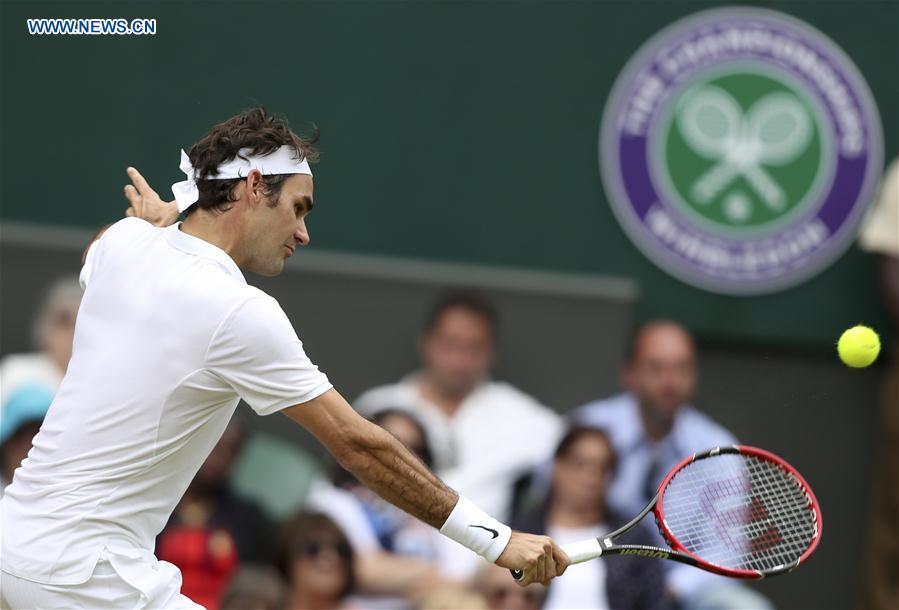 (SP)BRITAIN-LONDON-TENNIS-WIMBLEDON-FEDERER VS JOHNSON