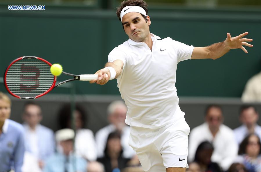 (SP)BRITAIN-LONDON-TENNIS-WIMBLEDON-FEDERER VS JOHNSON