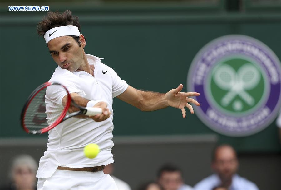 (SP)BRITAIN-LONDON-TENNIS-WIMBLEDON-FEDERER VS JOHNSON