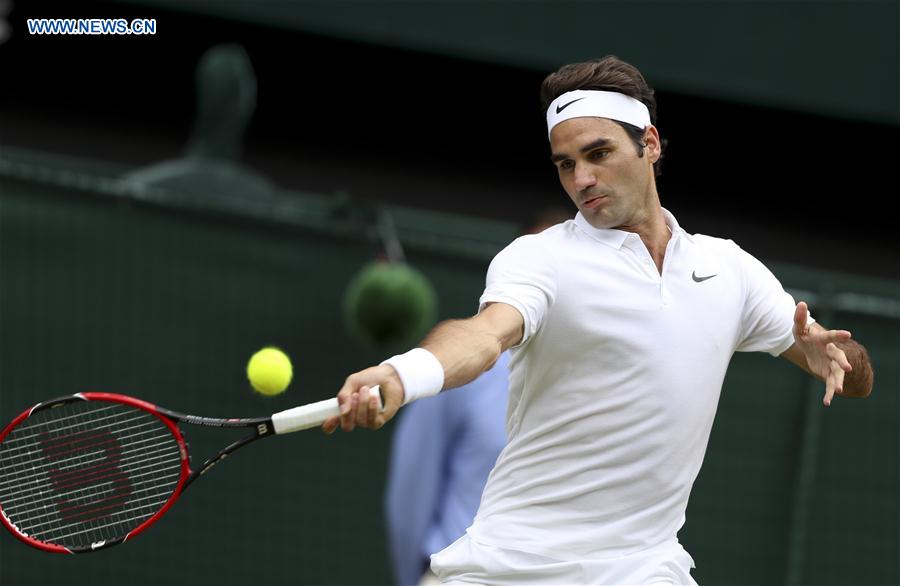 (SP)BRITAIN-LONDON-TENNIS-WIMBLEDON-FEDERER VS JOHNSON