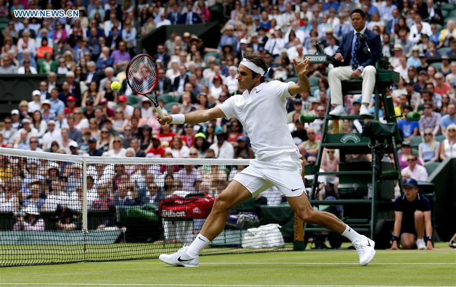 (SP)BRITAIN-LONDON-TENNIS-WIMBLEDON-FEDERER VS JOHNSON
