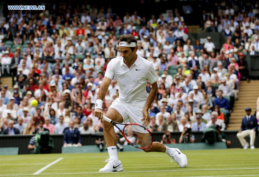 (SP)BRITAIN-LONDON-TENNIS-WIMBLEDON-FEDERER VS JOHNSON