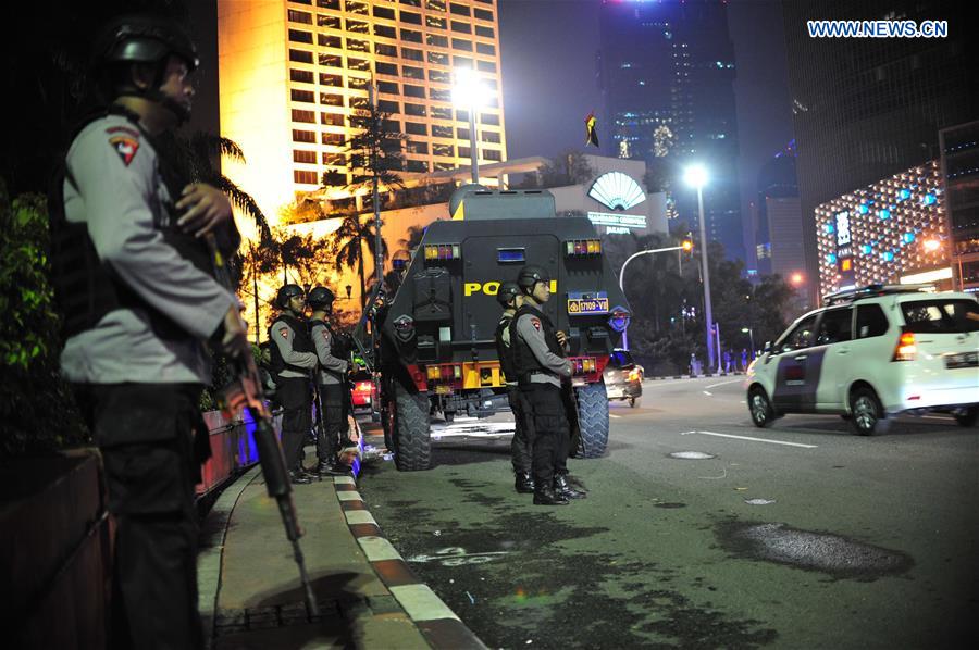Indonesian police stand guard during the end of the fasting month of Ramadan on the main street in Jakarta, Indonesia, July 5, 2016. Indonesian police stand guard during the end of the fasting month of Ramadan on the main street in Jakarta, Indonesia, July 5, 2016.