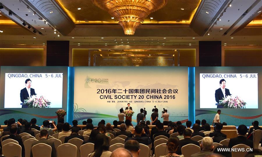 Representatives from home and abroad attend the closing ceremony of the Civil Society 20 China 2016 held in Qingdao, east China's Shandong Province, July 6, 2016. 
