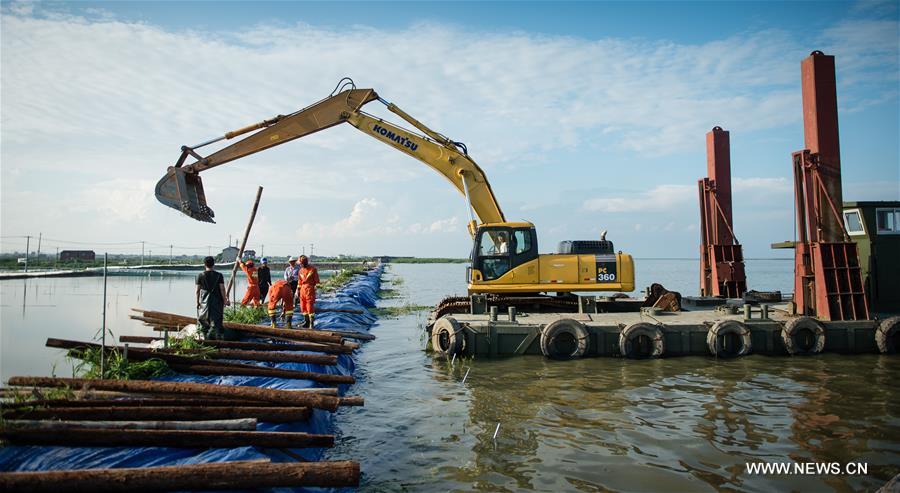 Water level of the Gehu Lake in Yixing surpassed the warning line due to continuous rainfall. 