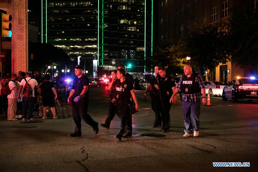 Secutiry force is strengthened in downtown Dallas following the sniper shooting in Dallas, the United States, July 7, 2016.