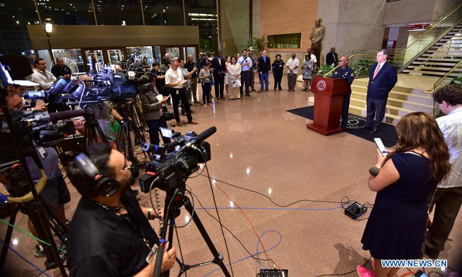 Secutiry force is strengthened in downtown Dallas following the sniper shooting in Dallas, the United States, July 7, 2016.