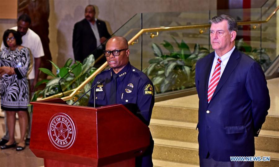 Secutiry force is strengthened in downtown Dallas following the sniper shooting in Dallas, the United States, July 7, 2016.