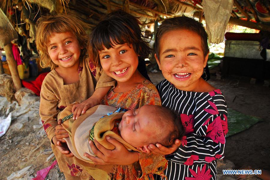Girls ride on a donkey-cart on World Population Day in Islamabad, capital of Pakistan on July 11, 2016. Girls ride on a donkey-cart on World Population Day in Islamabad, capital of Pakistan on July 11, 2016.