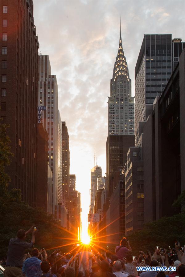 Photo taken on July 11, 2016 shows the Manhattanhenge in Manhattan, New York, the United States. Photo taken on July 11, 2016 shows the Manhattanhenge in Manhattan, New York, the United States.