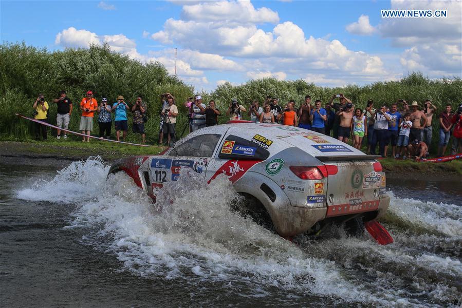 Liu Kun and Pan Hongyu of Panda Team of China compete during the third stage of the Moscow-Beijing Silk Road rally 2016 in Ufa, Russia on July 11, 2016.