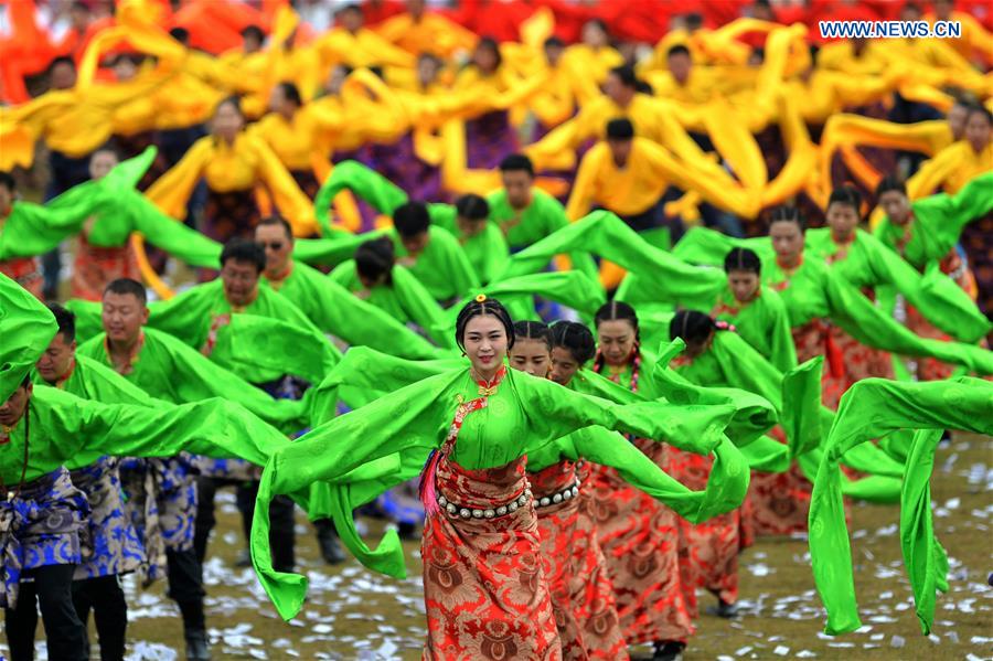 People dance at the opening ceremony of Shambhala Tourism Festival in Gannan, northwest China's Gansu Province, July 17, 2016. People dance at the opening ceremony of Shambhala Tourism Festival in Gannan, northwest China's Gansu Province, July 17, 2016.
