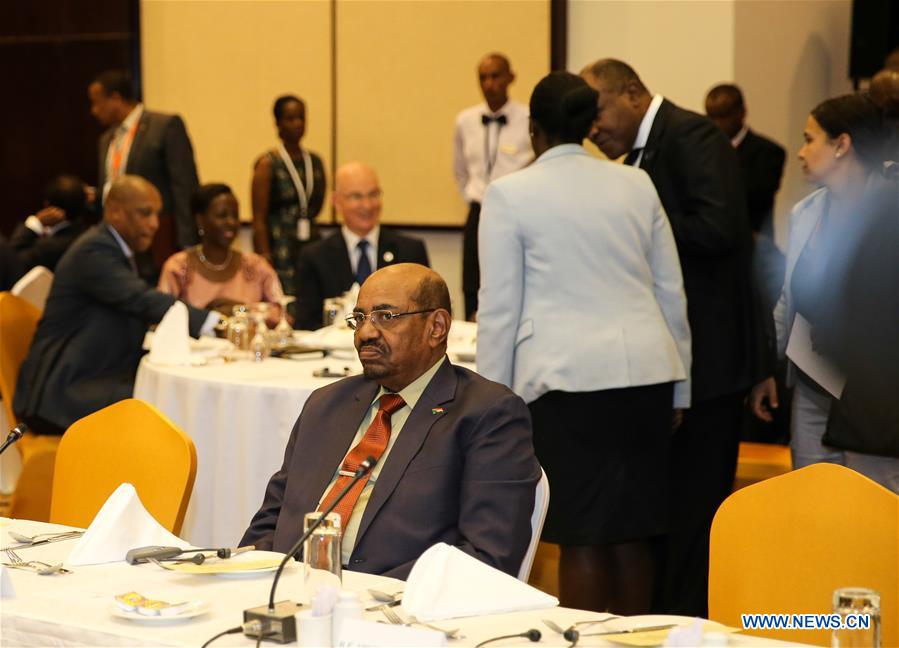 Sudanese President Omar al-Bashir (front) attends a meeting during the African Union (AU) Summit in Kigali, Rwanda, July 16, 2016.