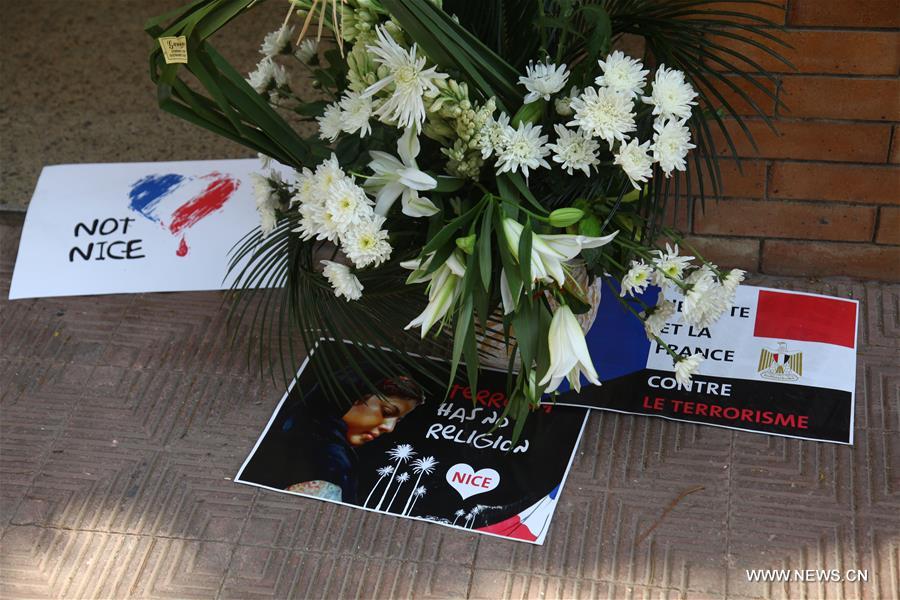 French national flag flies at half-mast at the French Embassy in Giza, Egypt, July 17, 2016, to mourn the victims of a deadly attack took place in Nice, France on Thursday