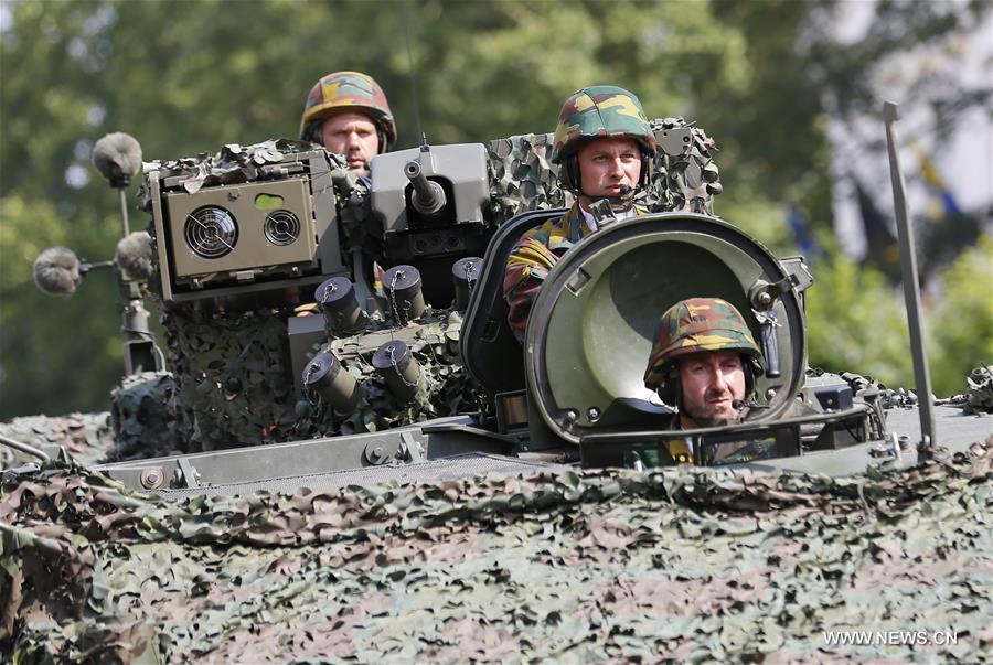 Belgian Special Forces soldiers attend the Military Parade to celebrate Belgium's National Day in Brussels, Belgium, July 21, 2016. Belgian Special Forces soldiers attend the Military Parade to celebrate Belgium's National Day in Brussels, Belgium, July 21, 2016.
