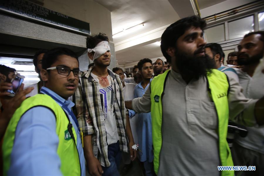 Kashmiri volunteers transfer a wounded person from an ambulance outside a hospital in Srinagar, summer capital of Indian-controlled Kashmir, on July 22, 2016. Kashmiri volunteers transfer a wounded person from an ambulance outside a hospital in Srinagar, summer capital of Indian-controlled Kashmir, on July 22, 2016.