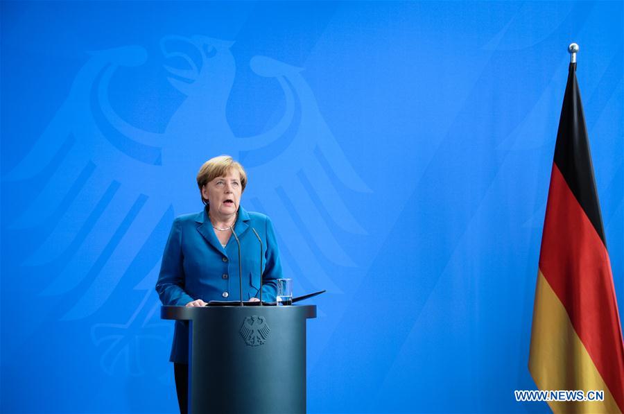 German Chancellor Angela Merkel arrives to attend a press conference in Berlin, capital of Germany, on July 23, 2016. 