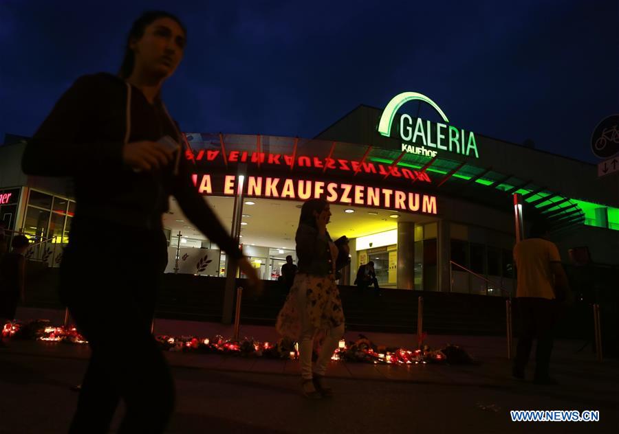 GERMANY-MUNICH-SHOOTOUT-MOURNING