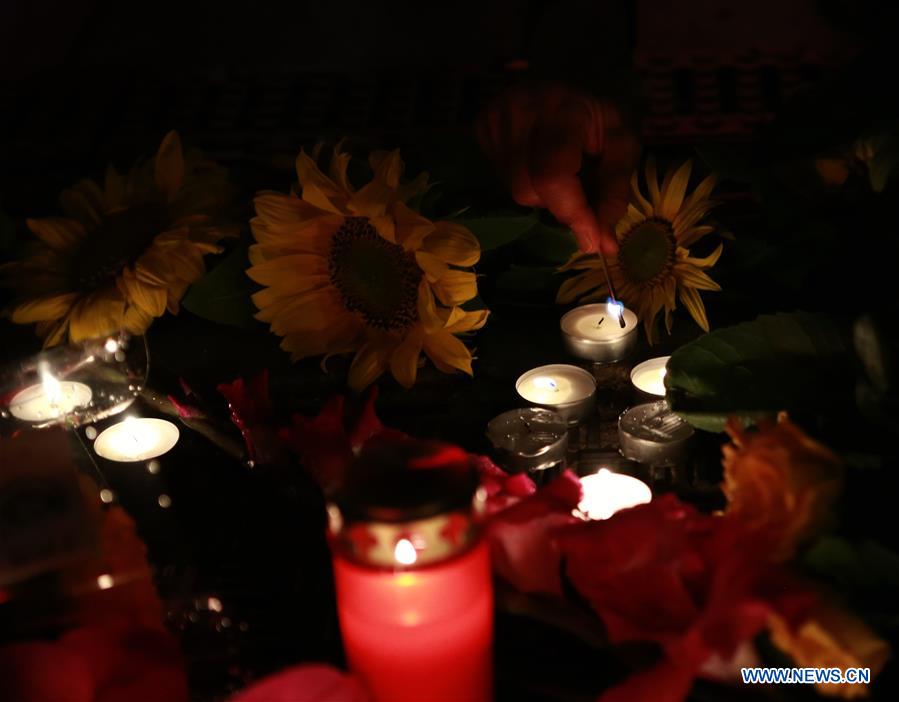 GERMANY-MUNICH-SHOOTOUT-MOURNING