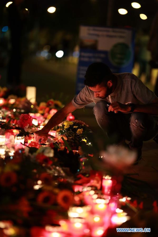 GERMANY-MUNICH-SHOOTOUT-MOURNING