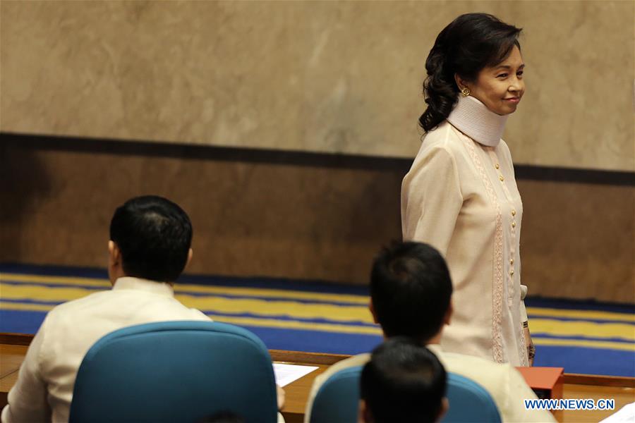 Former Philippine President Gloria Macapagal Arroyo, who is currently a lawmaker in the House of Representatives, attends the opening of the 17th Congress of the Philippines in Quezon City, the Philippines, July 25, 2016. 