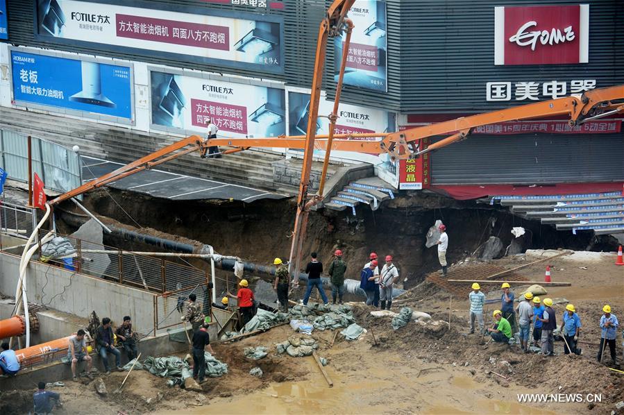 Due to the continuous rainstorm, the ground of the construction site of subway Line 9 collapsed on Monday. Due to the continuous rainstorm, the ground of the construction site of subway Line 9 collapsed on Monday.