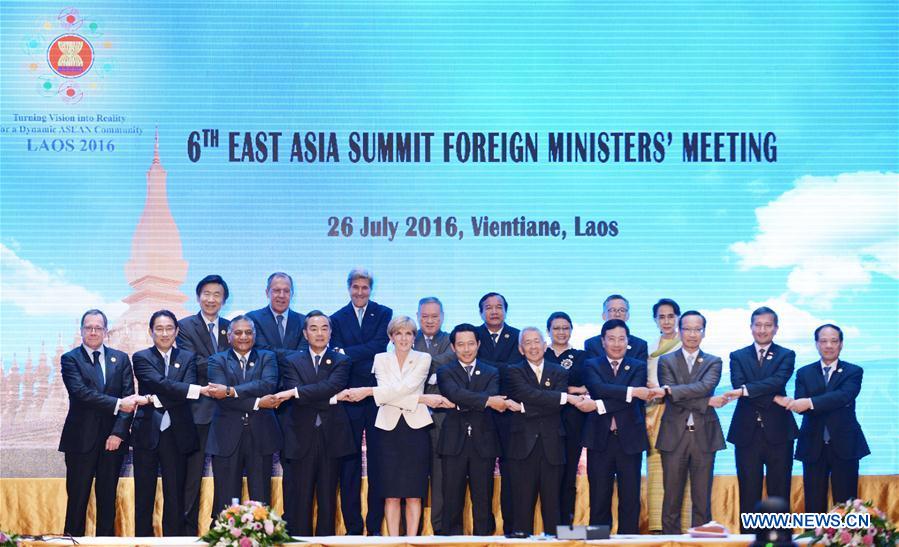 Participants pose for a group photo before the 6th East Asia Summit Foreign Ministers' Meeting in Vientiane, capital of Laos, July 26, 2016. Participants pose for a group photo before the 6th East Asia Summit Foreign Ministers' Meeting in Vientiane, capital of Laos, July 26, 2016.
