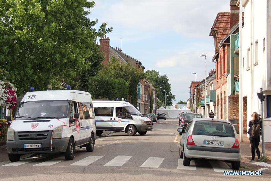 Police stand guard near the church where a priest was killed in Saint-Etienne du Rouvray, France on July 26, 2016. Police stand guard near the church where a priest was killed in Saint-Etienne du Rouvray, France on July 26, 2016.