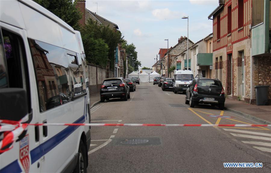 Police stand guard near the church where a priest was killed in Saint-Etienne du Rouvray, France on July 26, 2016. Police stand guard near the church where a priest was killed in Saint-Etienne du Rouvray, France on July 26, 2016.