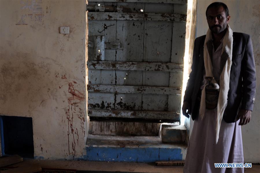 People inspect the mosque attacked by a gunman in Yemen's capital of Sanaa on July 27, 2016. People inspect the mosque attacked by a gunman in Yemen's capital of Sanaa on July 27, 2016.