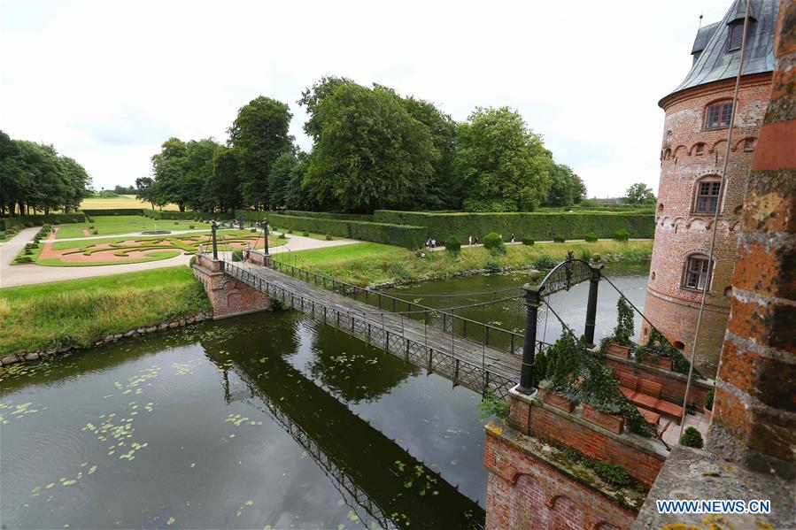 Photo taken on July 26, 2016 shows the moat of the Egeskov Castle in Funen, Denmark. Located in the south of the island of Funen, the Egeskov Castle was built by Frands Brockenhuss in 1554. 