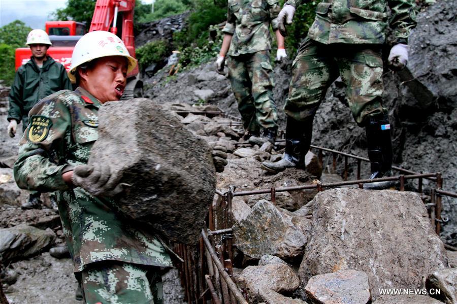 Traffic of the damaged Zham section of China-Nepal Highway resumed on Friday after the repair of Chinese armed transport police Traffic of the damaged Zham section of China-Nepal Highway resumed on Friday after the repair of Chinese armed transport police