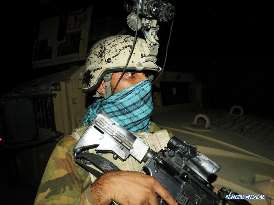 An Afghan special force member takes part in a night military operation against Taliban in Nad Ali district of Helmand province, Afghanistan, Aug. 2, 2016. An Afghan special force member takes part in a night military operation against Taliban in Nad Ali district of Helmand province, Afghanistan, Aug. 2, 2016.