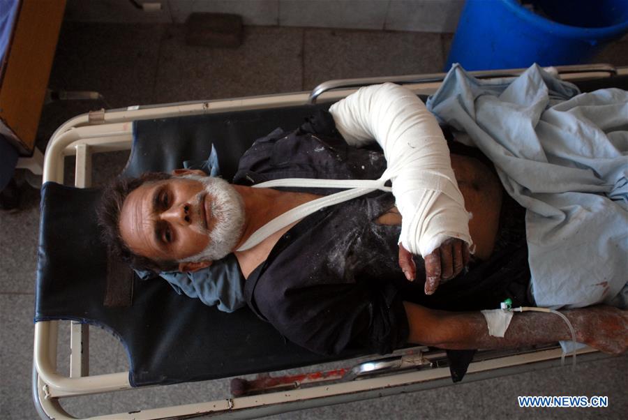 People transfer an injured man to a hospital in northwest Pakistan's Peshawar, Aug. 3, 2016. People transfer an injured man to a hospital in northwest Pakistan's Peshawar, Aug. 3, 2016.