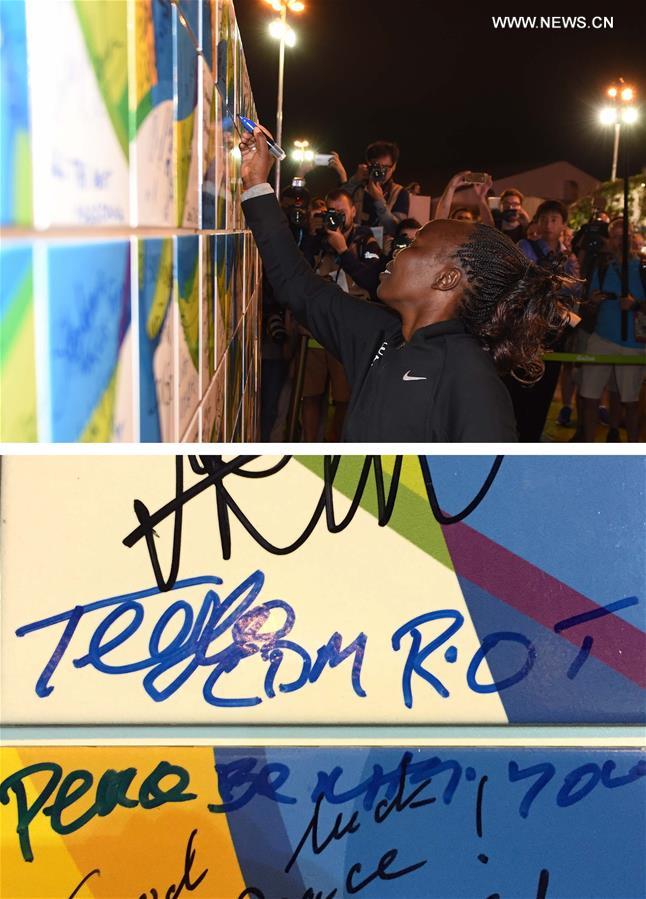 This combo photo shows Tegla Loroupe, athlete of Olympic Refugee Team, signs on the Olympic Truce Wall in the Olympic Village (up) and her signature (down) in Rio de Janeiro, Brazil, on Aug. 3, 2016.