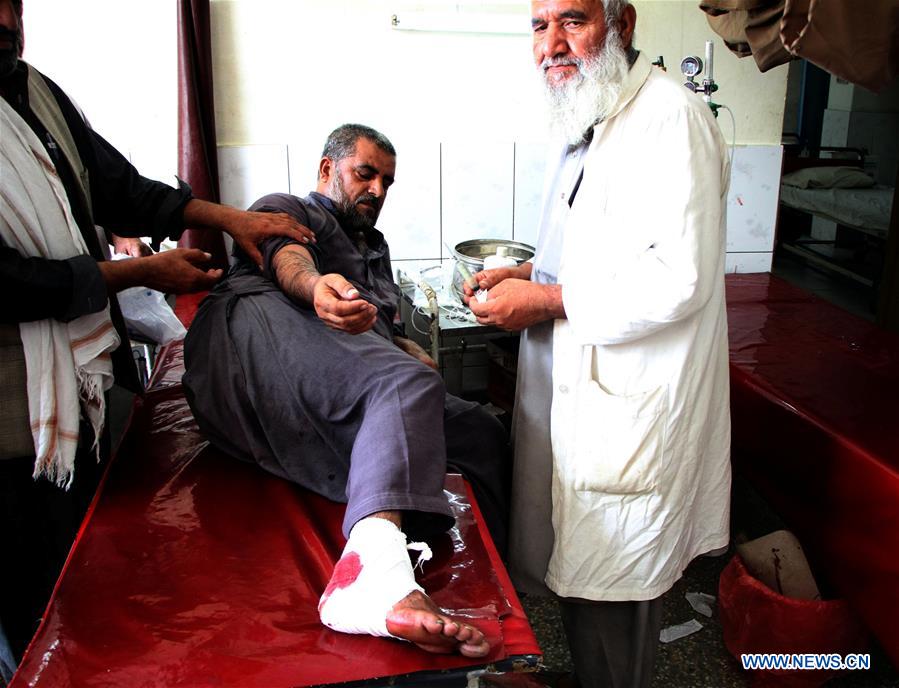 An injured man receives medical treatment at a local hospital after a blast in Mehtarlam, capital of Laghman province, Afghanistan, Aug. 4, 2016.