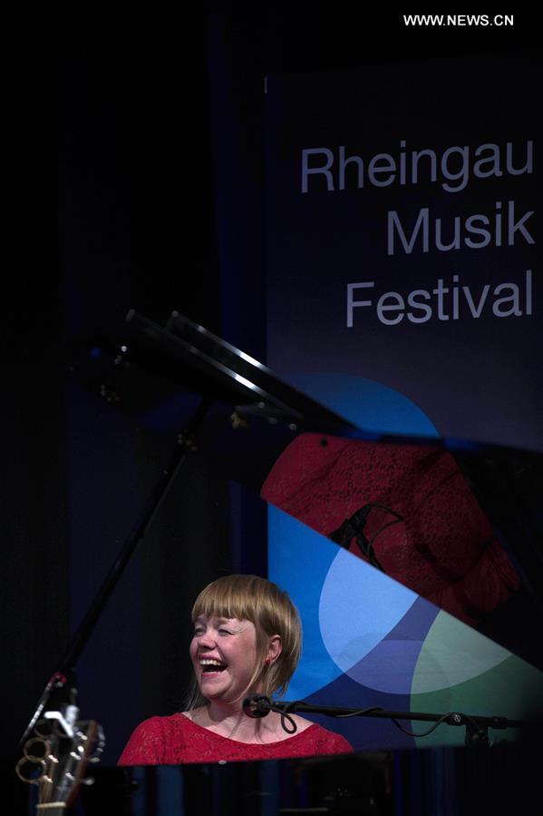 Norwegian singer and lyricist Randi Tytingvaag (L) performs during the Rheingau Music Festival at the Kuenstler Winery in Germany, on Aug. 6, 2016. Norwegian singer and lyricist Randi Tytingvaag (L) performs during the Rheingau Music Festival at the Kuenstler Winery in Germany, on Aug. 6, 2016.