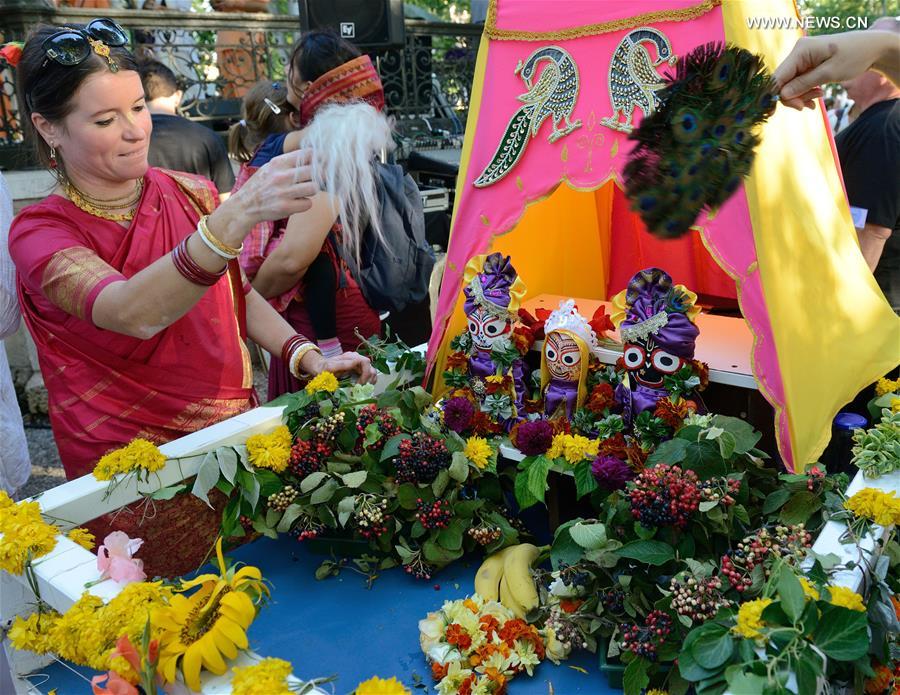A woman participates in Ratha Yatra festival in Zagreb, capital of Croatia, on Aug. 6, 2016. 