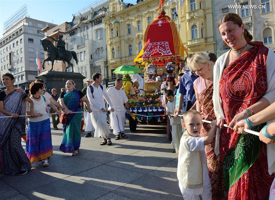 People participate in Ratha Yatra festival in Zagreb, capital of Croatia, on Aug. 6, 2016.