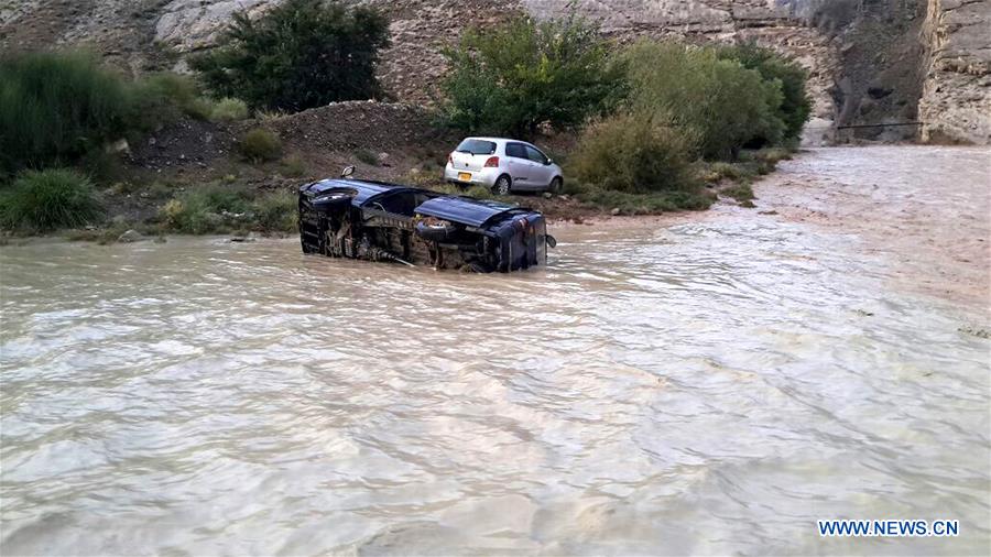 Rescuers search for the missing people at the flash flood site in Harnai, southwest Pakistan, on Aug. 7, 2016.