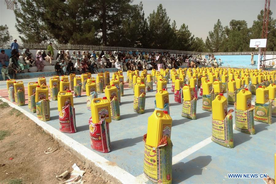 Photo taken on Aug. 11, 2016, shows relief goods donated by Afghan government in Helmand province, Afghanistan. 