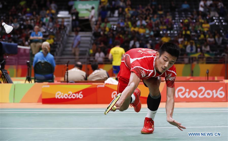 China's Chen Long competes against Poland's Adrian Dziolko during a men's singles group play stage match of Badminton at the 2016 Rio Olympic Games in Rio de Janeiro, Brazil, on Aug. 13, 2016. 