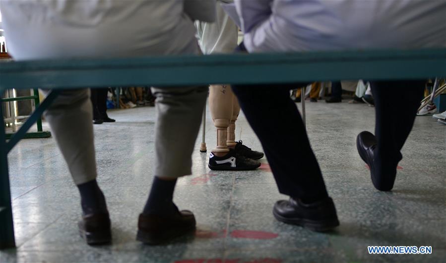 AFGHANISTAN-KABUL-ORTHOPEDIC CENTER OF THE RED CROSS-PRACTICE WALKING