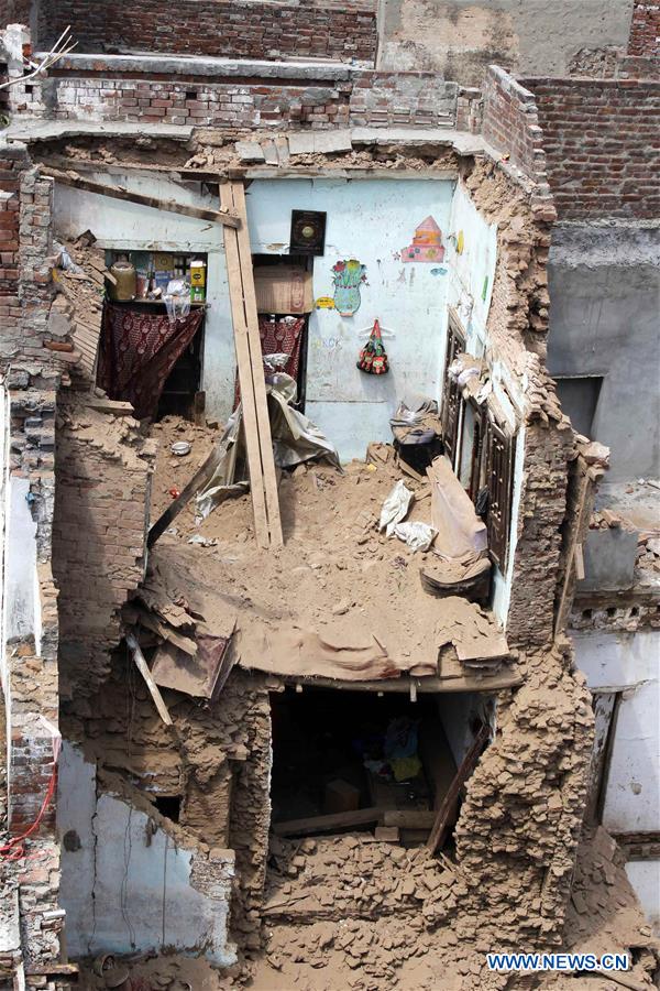  At least five people were killed and eight others injured when the roof of a house caved in during a wedding ceremony in Lahore on Sunday, local media reported. (Xinhua/Jamil Ahmed)