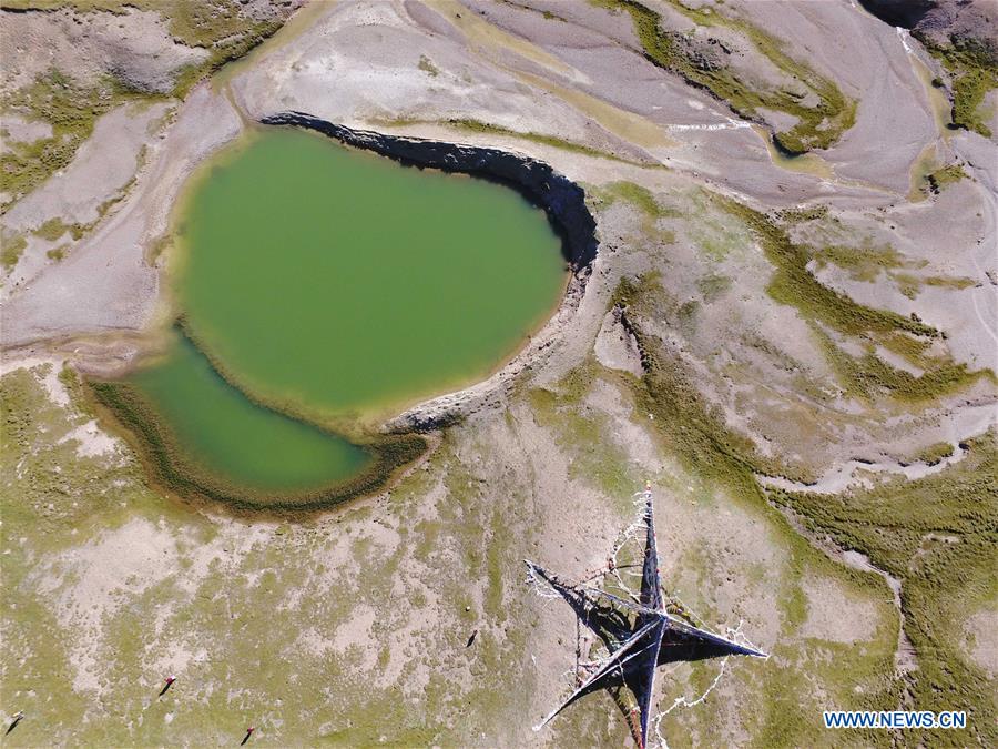 An aerial photo taken on Aug. 19, 2016 shows the area of the source of Lancang River in Yushu, northwest China's Qinghai Province.